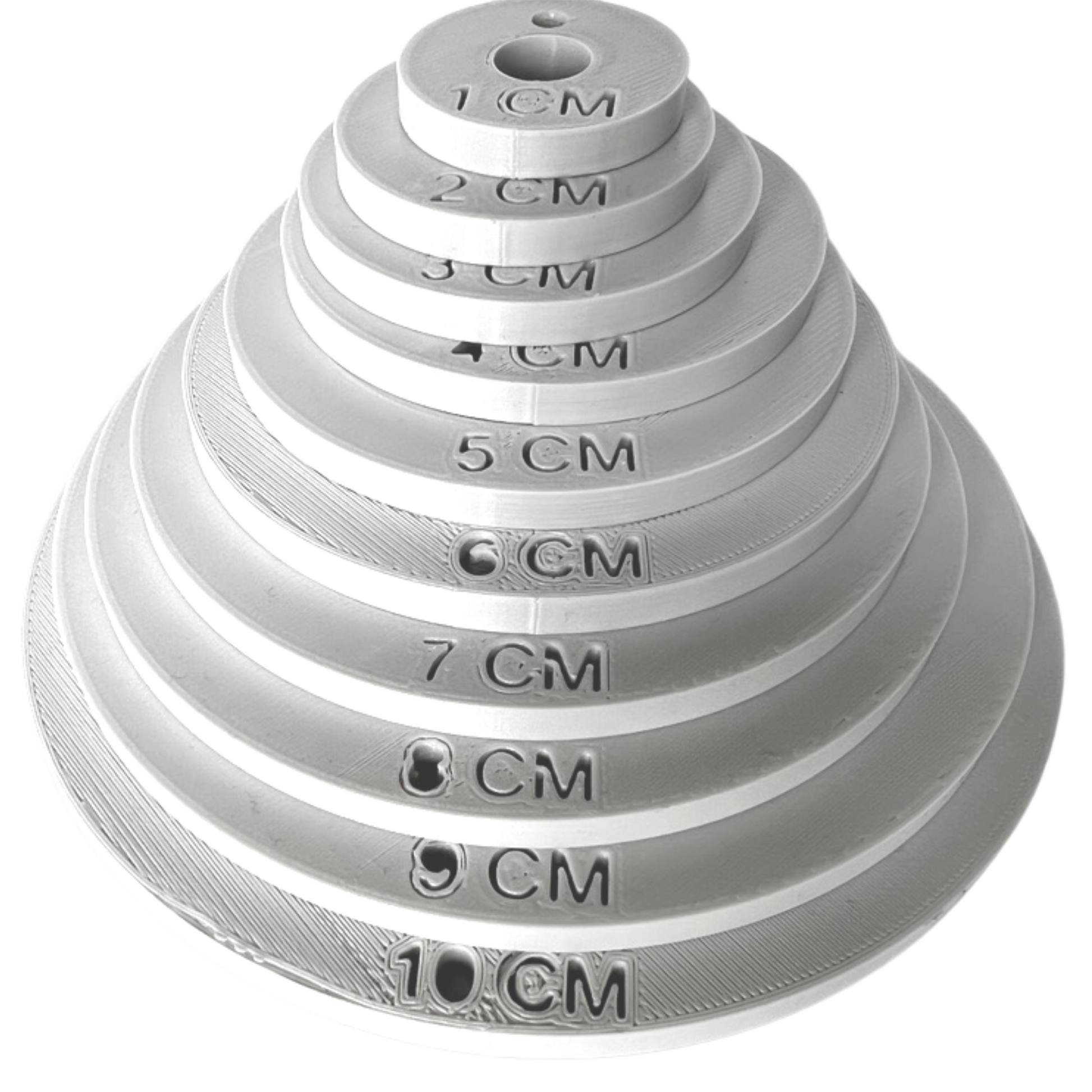 Stack of off-white 3D printed cervical dilation rings to show how the cervix dilates from one to ten centimetres during labour and delivery